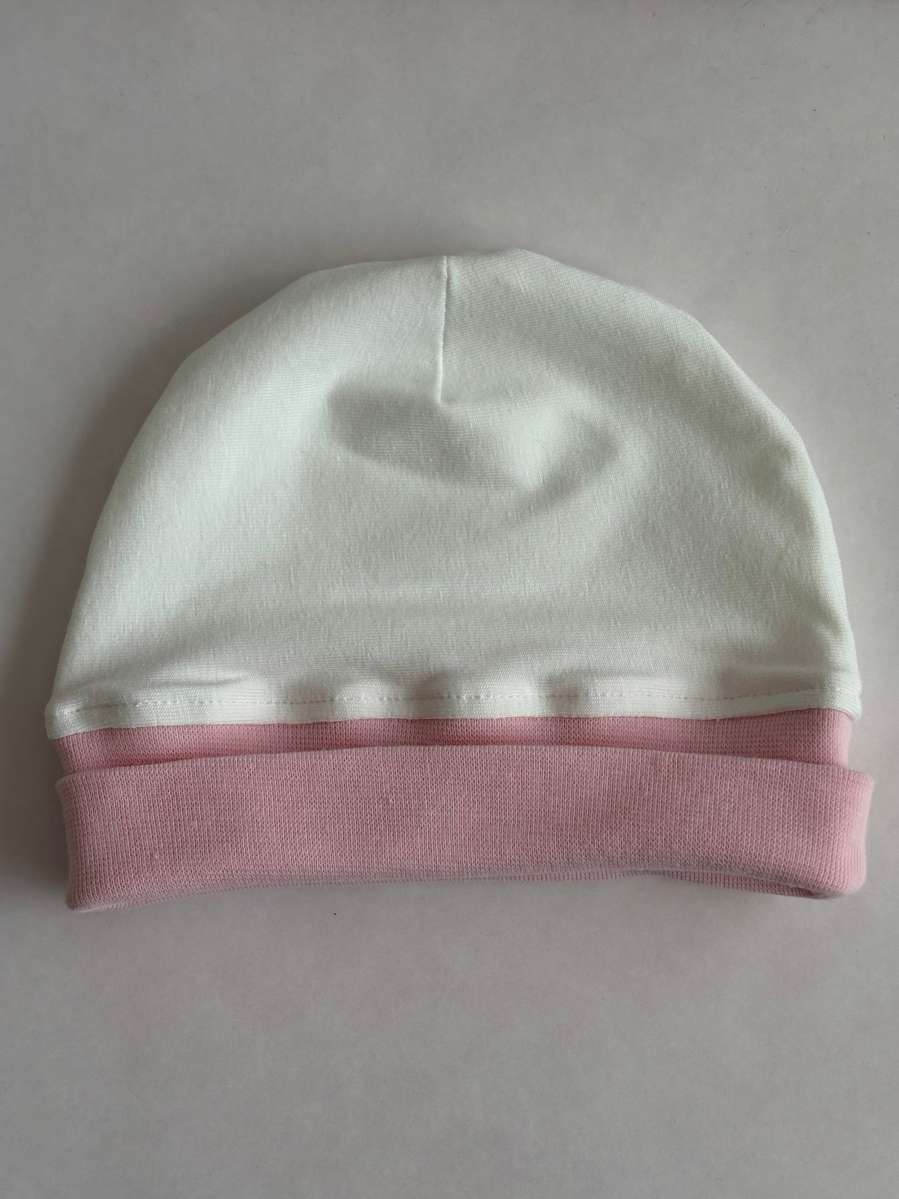 Babymössa i rosa/vit